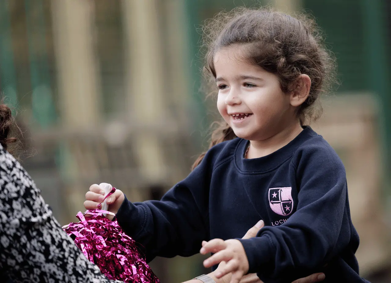 girl running to teacher