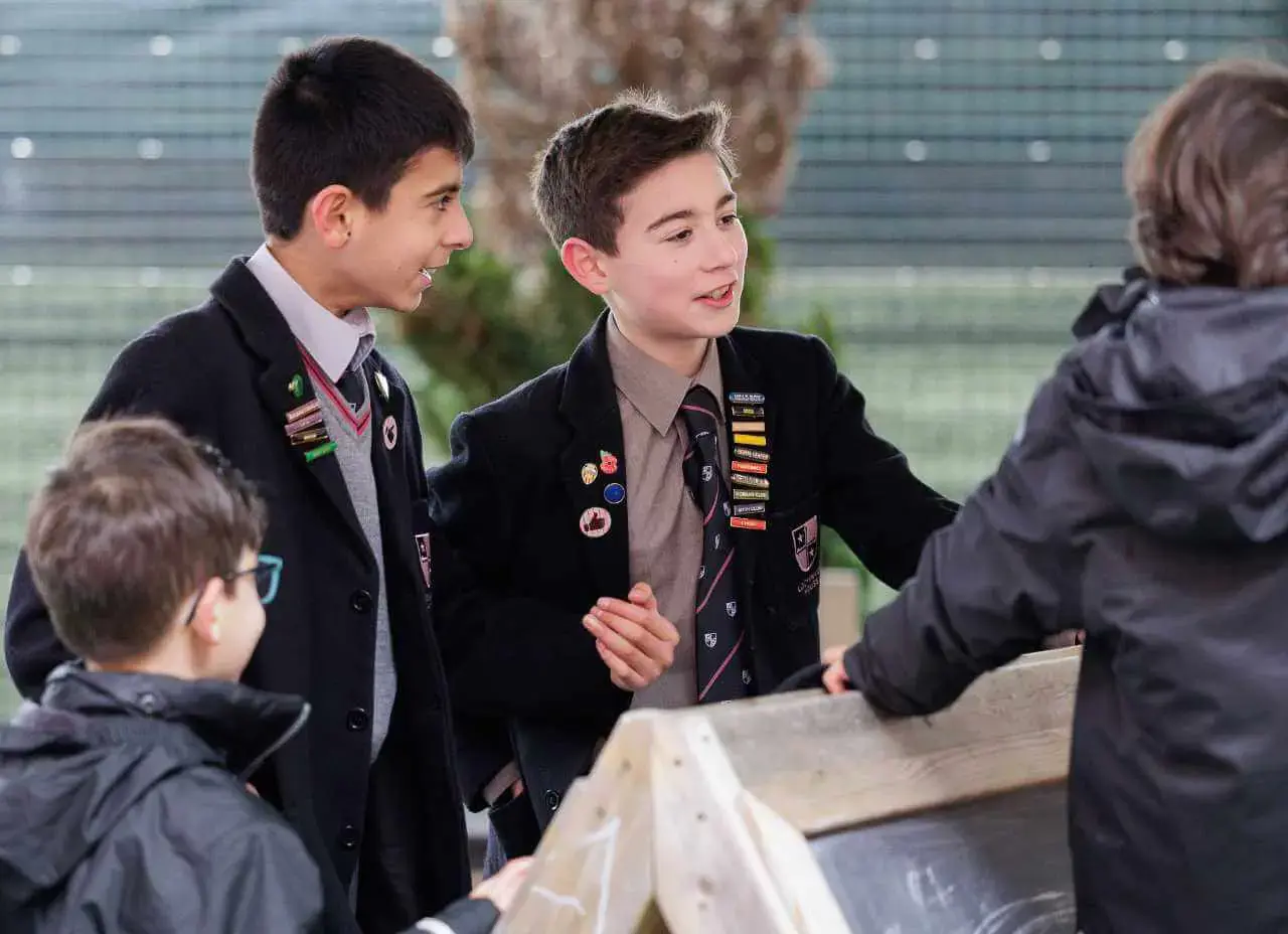 pupil voice head boys talking with pre prep pupilsContent Image