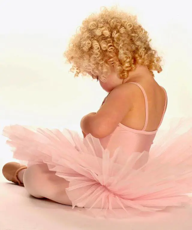 Girl in a baby ballet class wearing a tutu